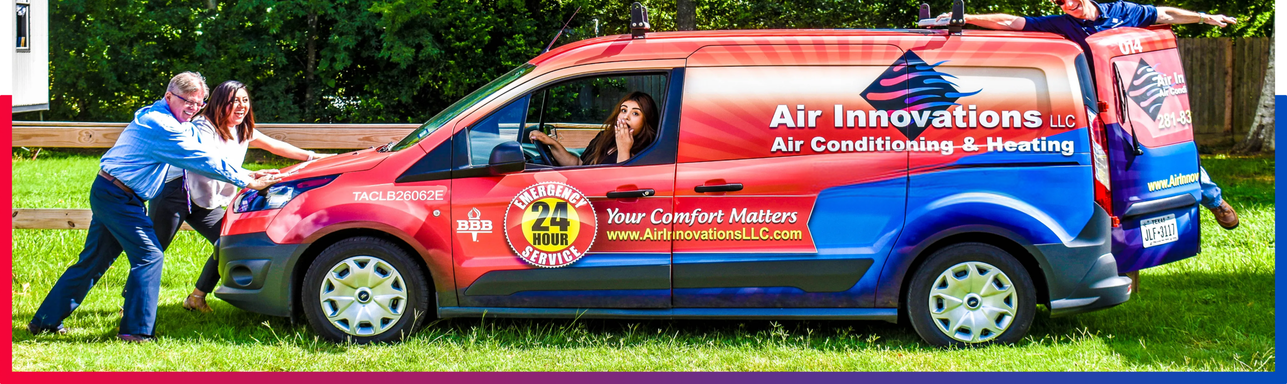 employees next to a work van